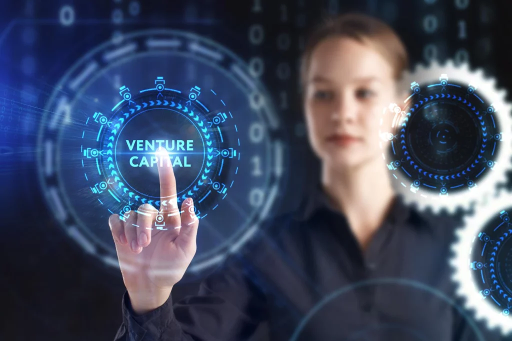 Woman touching a glowing blue digital interface with gears in the background